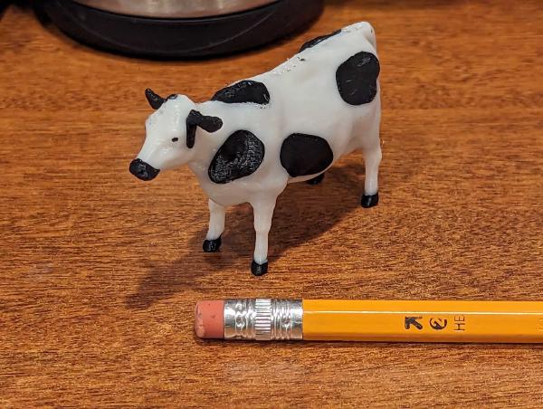 Multicolor Cow Figurine