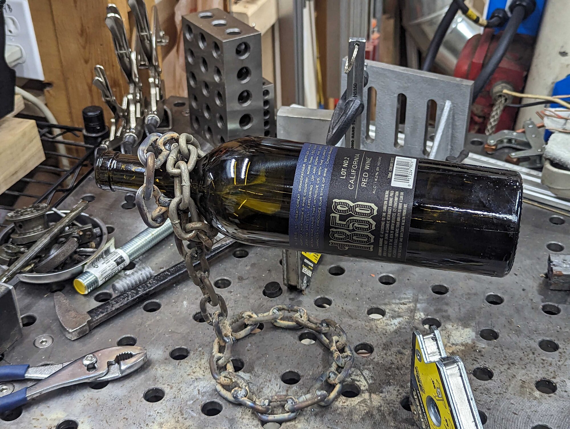 ./chain-with-bottle.jpg ./chain-with-bottle.jpg